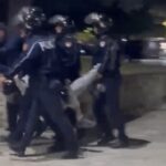 Policia e pashpirt / Kap si kafshë protestuesin me këmbën e thyer dhe në gjendje të fikti për ta shoqëruar